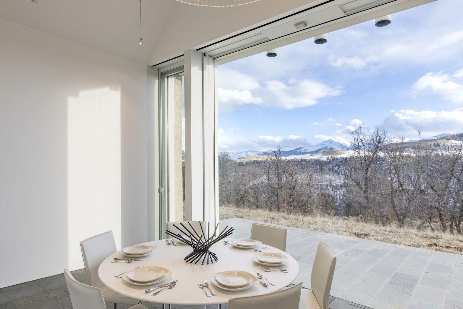 1068 Wilson Way Telluride, CO 81435 - Photo 14 of 40 a view of a dining room with furniture window and outside view
