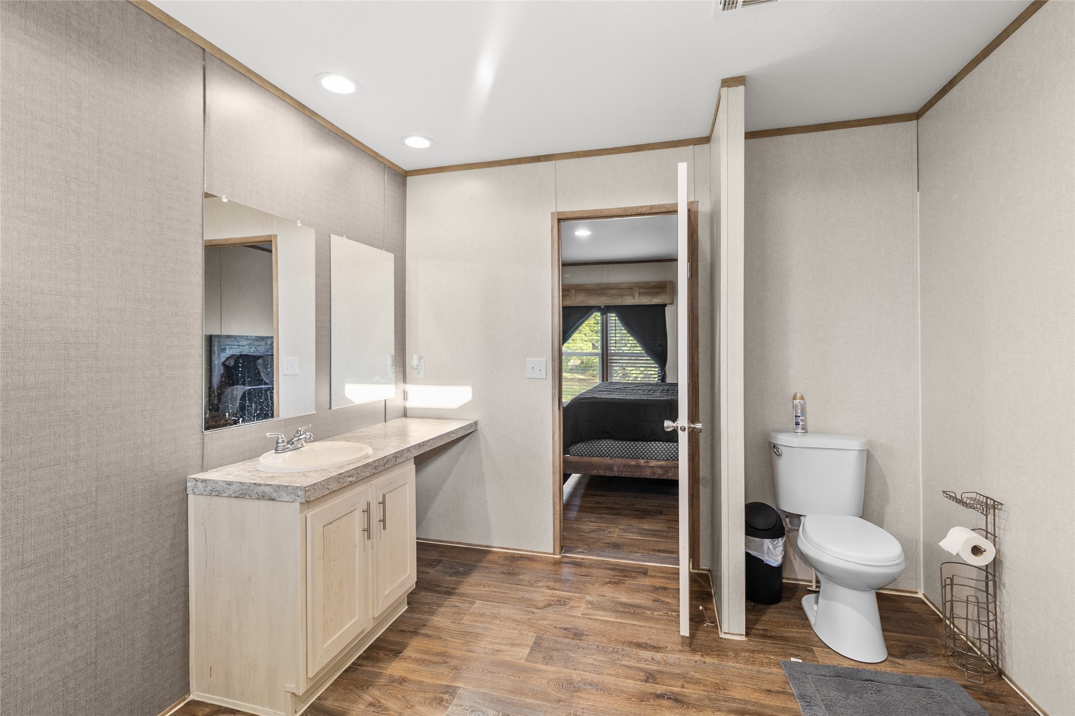 43 Ironwood Road Victoria, TX 77904 - Photo 8 of 21 a spacious bathroom with a toilet sink and mirror