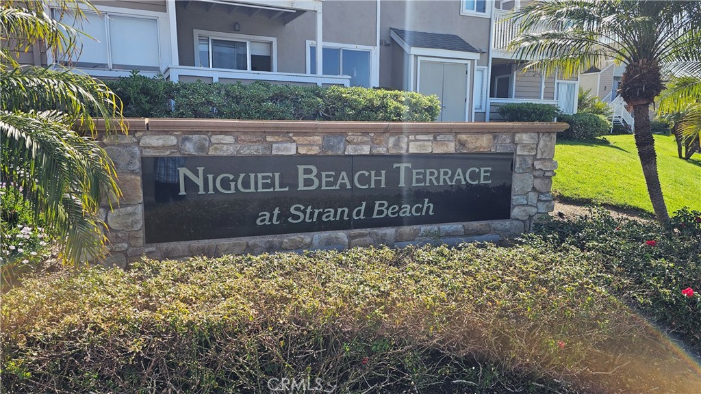 34146 Selva Road, Unit 198 Dana Point, CA 92629 - Photo 2 of 17 a sign on the side of a building