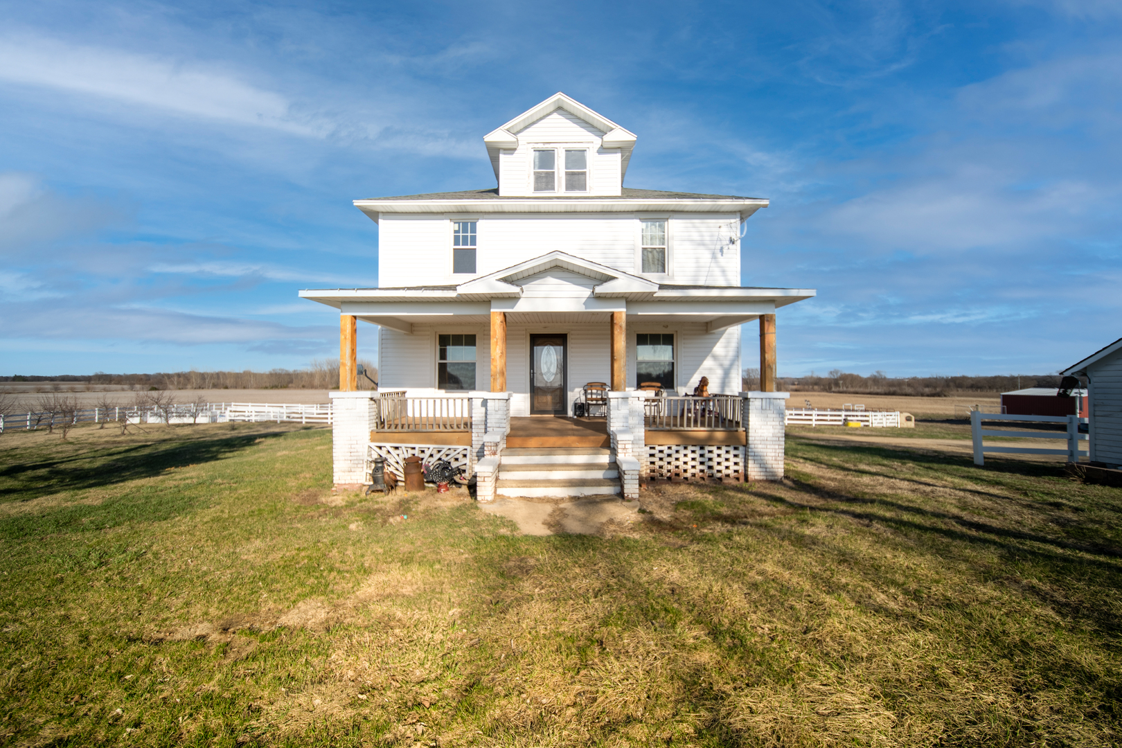 a swimming pool with outdoor seating