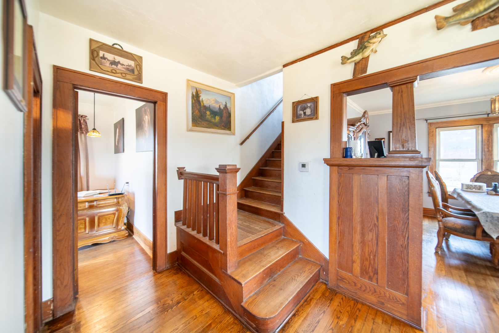 1801 Lee Center Road Amboy, IL 61310 - Photo 13 of 45 a view of a hallway with wooden floor and staircase