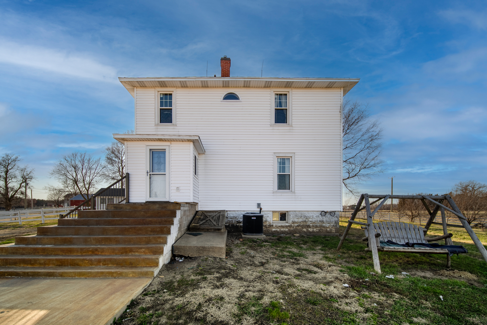 1801 Lee Center Road Amboy, IL 61310 - Photo 34 of 45 a front view of a house with garden