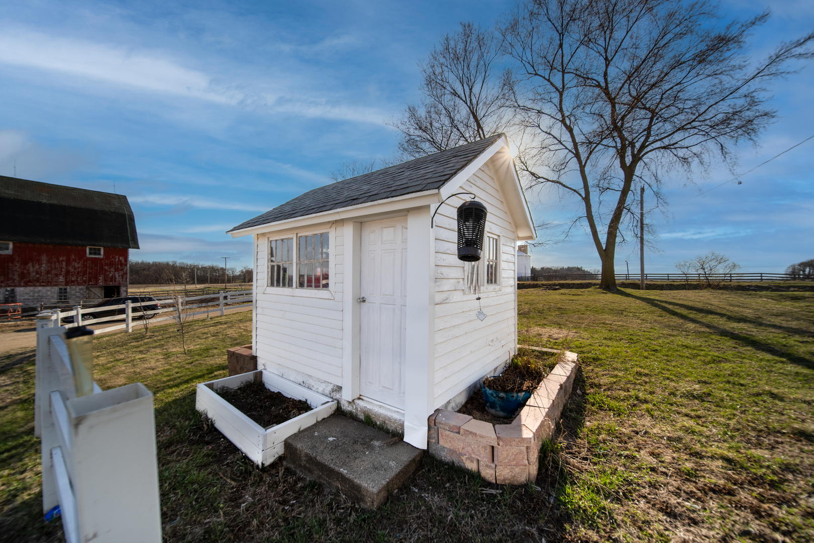 1801 Lee Center Road Amboy, IL 61310 - Photo 39 of 45 a view of a couches with wooden floor in front of house