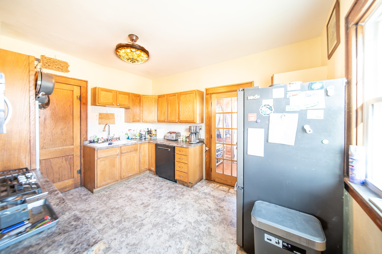 1801 Lee Center Road Amboy, IL 61310 - Photo 4 of 45 a kitchen with a refrigerator and countertop