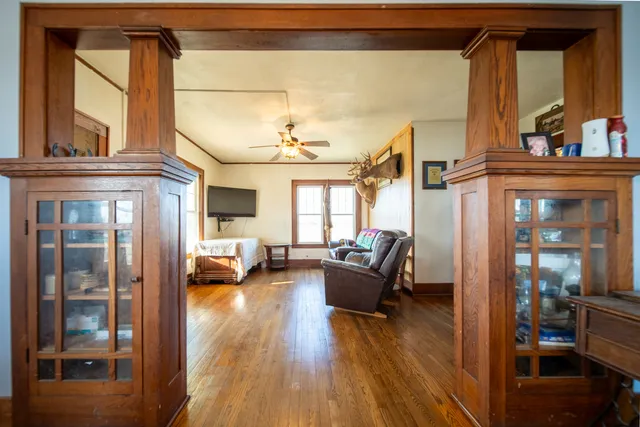 a living room with furniture and a fireplace