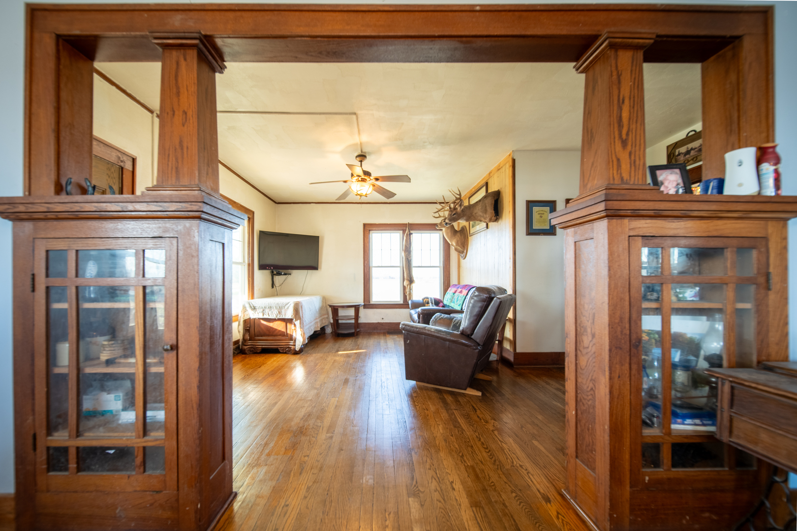 1801 Lee Center Road Amboy, IL 61310 - Photo 10 of 45 a living room with furniture and a fireplace