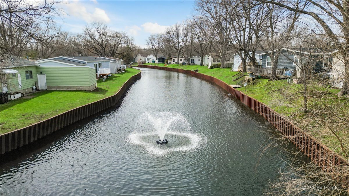 173 Northshore Road Elgin, IL 60123 - Photo 22 of 39 a view of a house with a yard