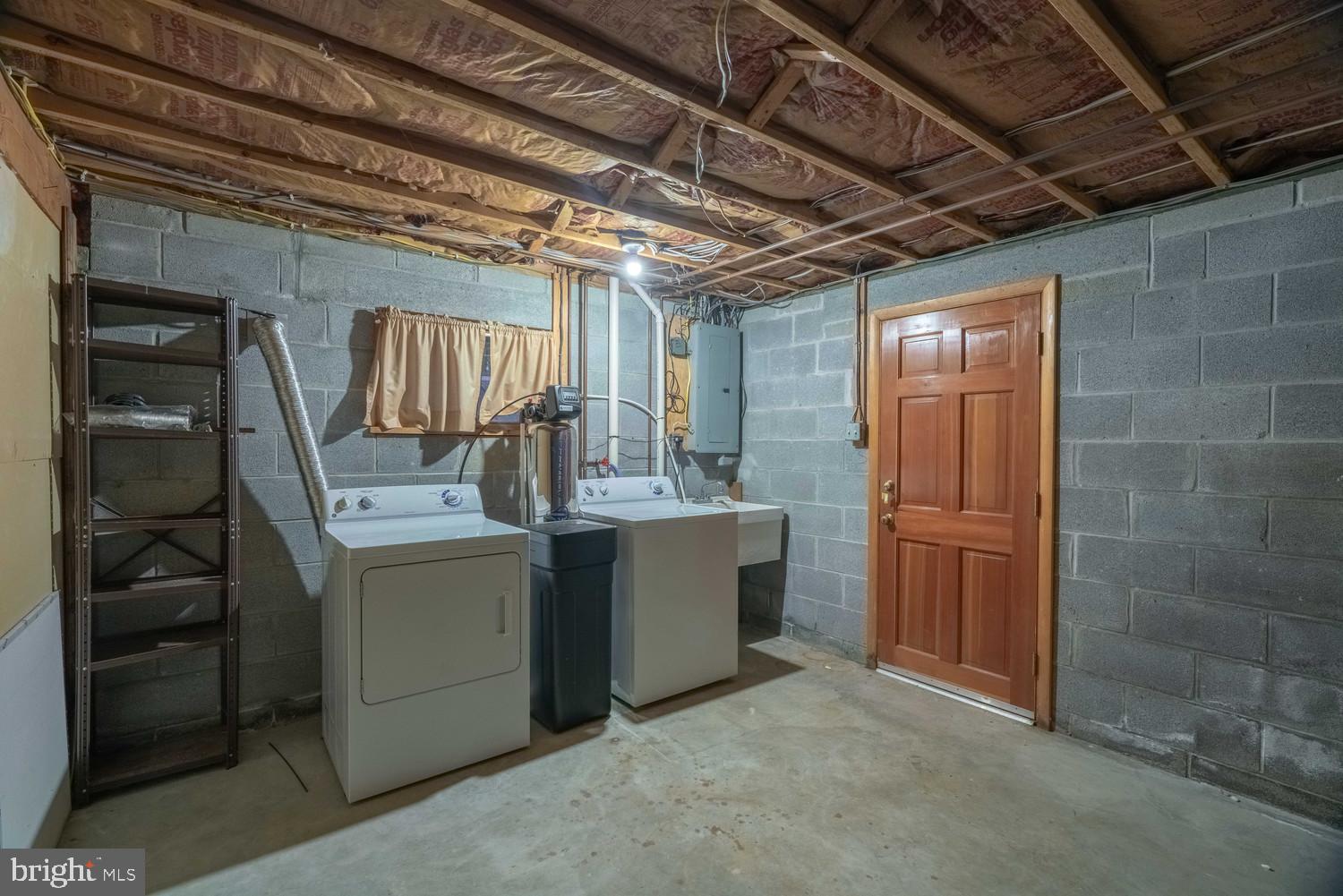 17511 Gay Street Hagerstown, MD 21740 - Photo 13 of 30 a view of storage and utility room with washer and dryer