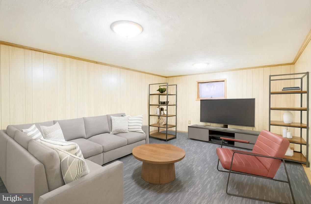 17511 Gay Street Hagerstown, MD 21740 - Photo 14 of 30 a living room with furniture and a flat screen tv