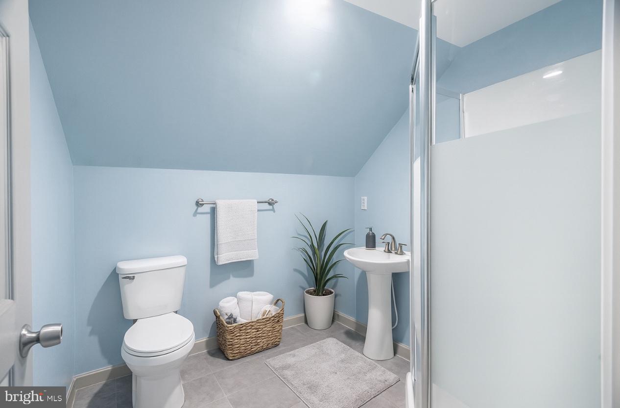 17511 Gay Street Hagerstown, MD 21740 - Photo 20 of 30 a bathroom with a toilet a sink and a mirror