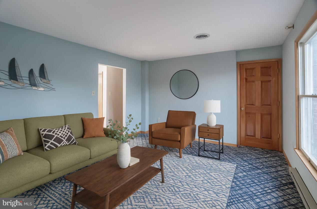 17511 Gay Street Hagerstown, MD 21740 - Photo 3 of 30 a living room with furniture and a rug