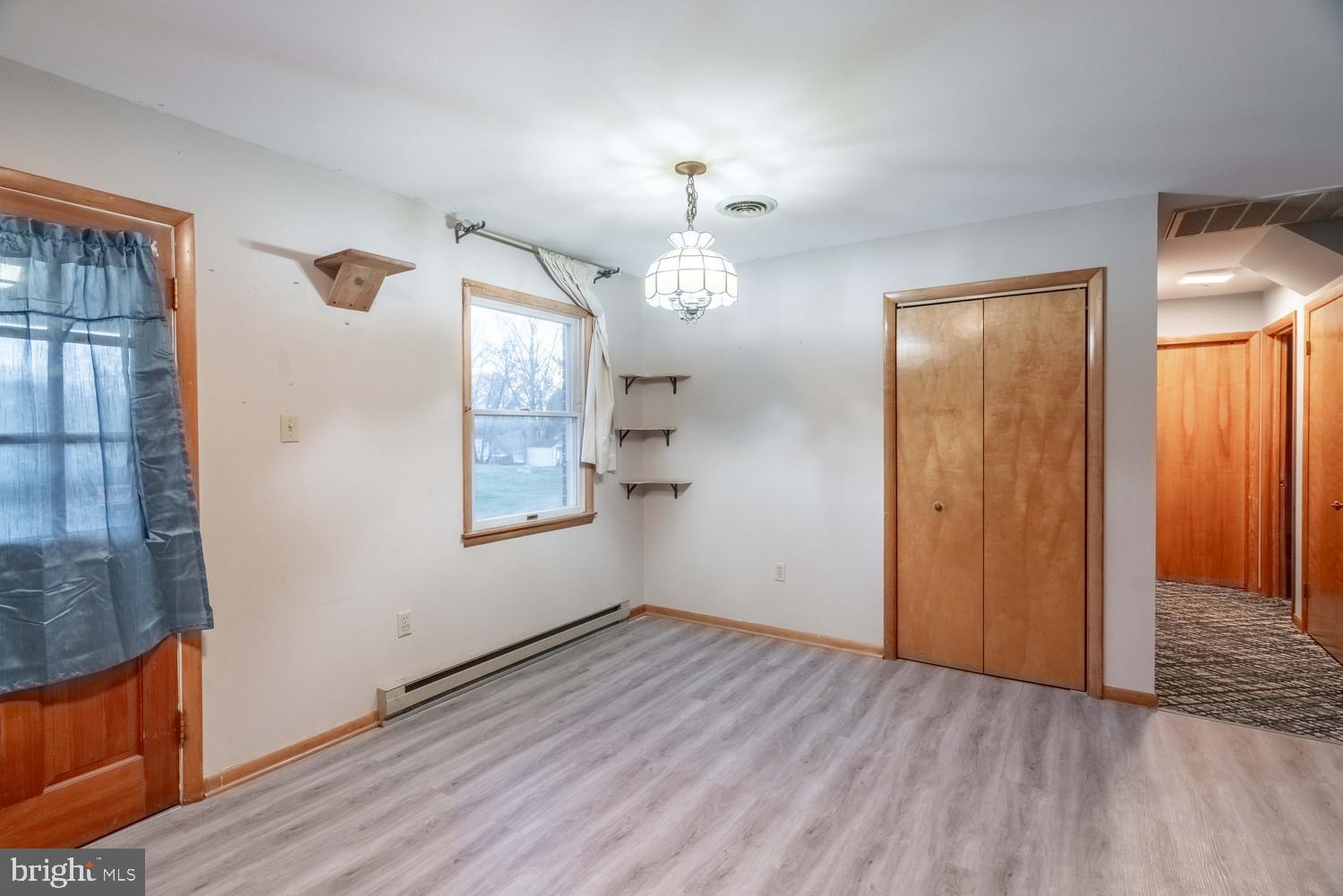 17511 Gay Street Hagerstown, MD 21740 - Photo 5 of 30 wooden floor in an empty room with a window