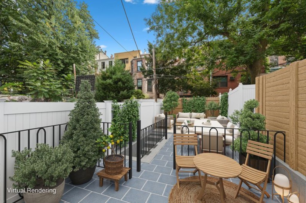 105 St Felix Street, Unit 1 Brooklyn, NY 11217 - Photo 8 of 11 a view of a chairs and table in backyard