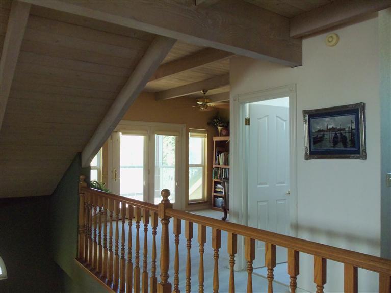 19292 Farallon Road Madera, CA 93638 - Photo 26 of 38 Upstairs loft and bathroom door.