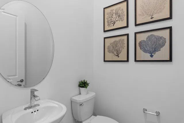 a bathroom with a toilet and a sink