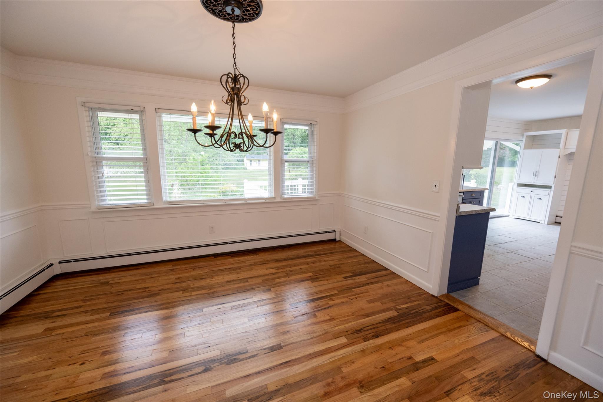 136 Foggintown Road Brewster, NY 10509 - Photo 13 of 50 a view of an empty room with wooden floor and a window