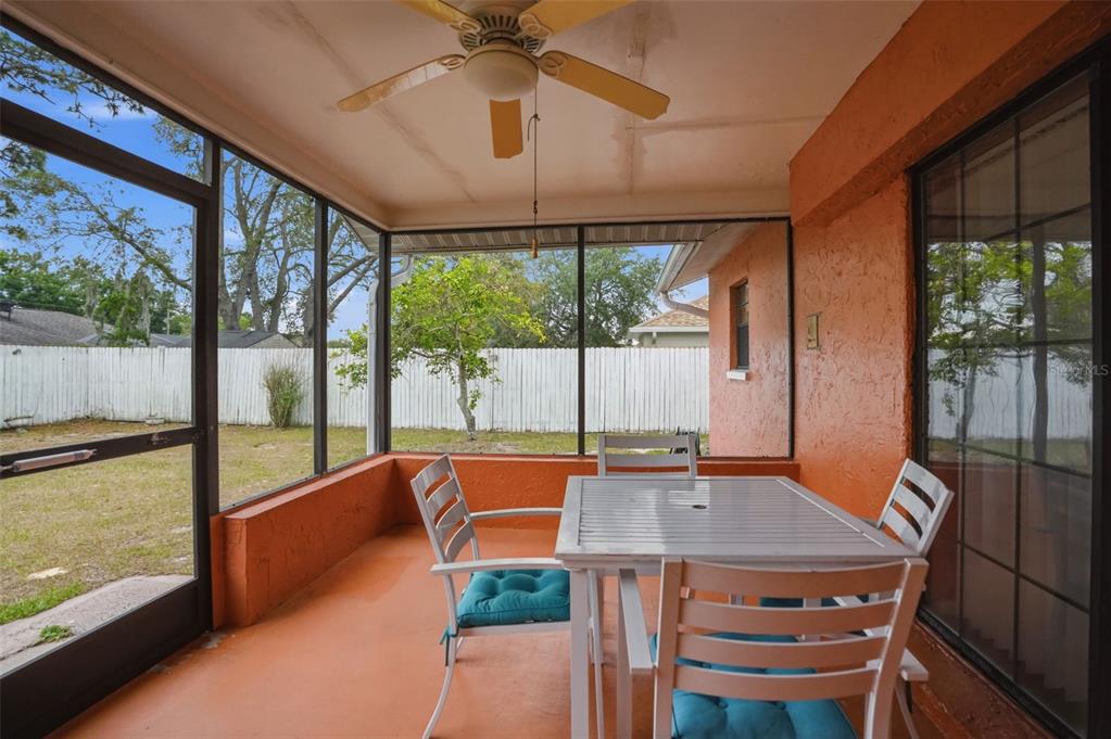 11286 Roland Street Spring Hill, FL 34609 - Photo 40 of 54 a view of a dining room with furniture window and outside view