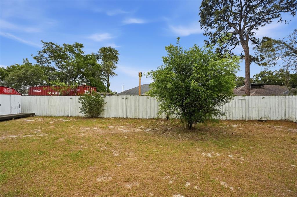 11286 Roland Street Spring Hill, FL 34609 - Photo 41 of 54 a view of outdoor space and yard