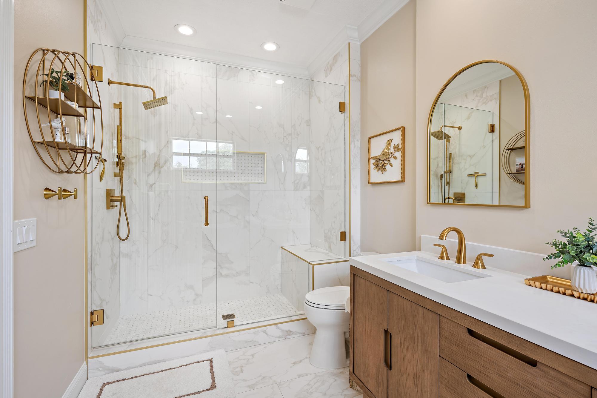 166 Honeysuckle Drive Jupiter, FL 33458 - Photo 15 of 26 a bathroom with a sink a toilet and shower
