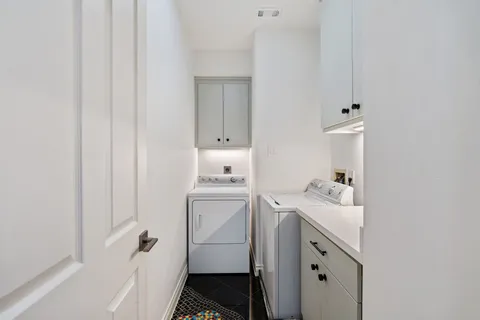 a bathroom with a sink toilet and tub