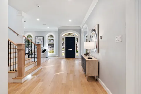a view of a hallway with a living room