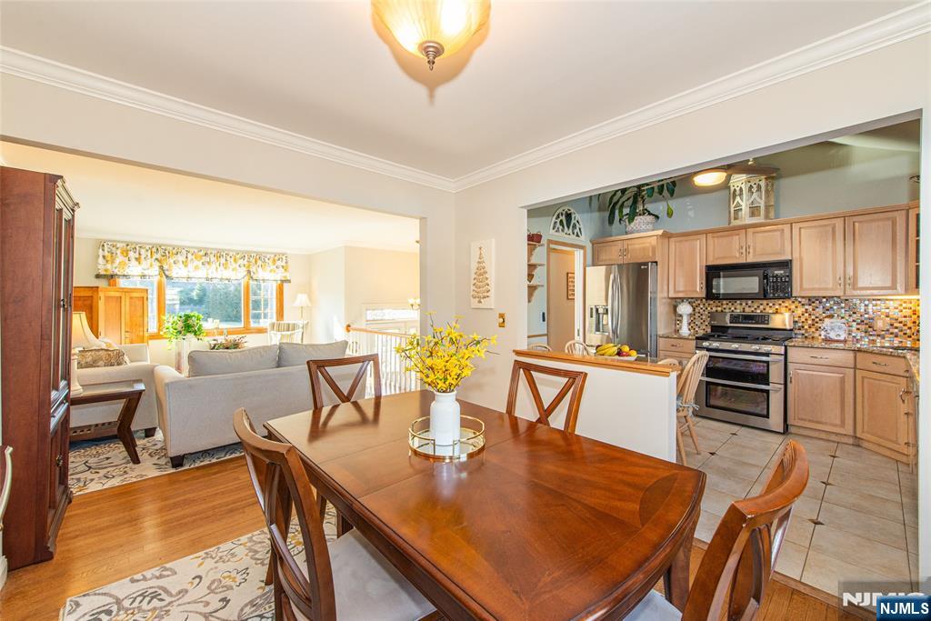 3 Springdale Road West Caldwell, NJ 07006 - Photo 13 of 38 a view of a dining room with furniture window and outside view