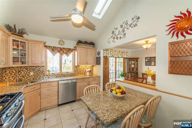 a kitchen with granite countertop lots of counter top space