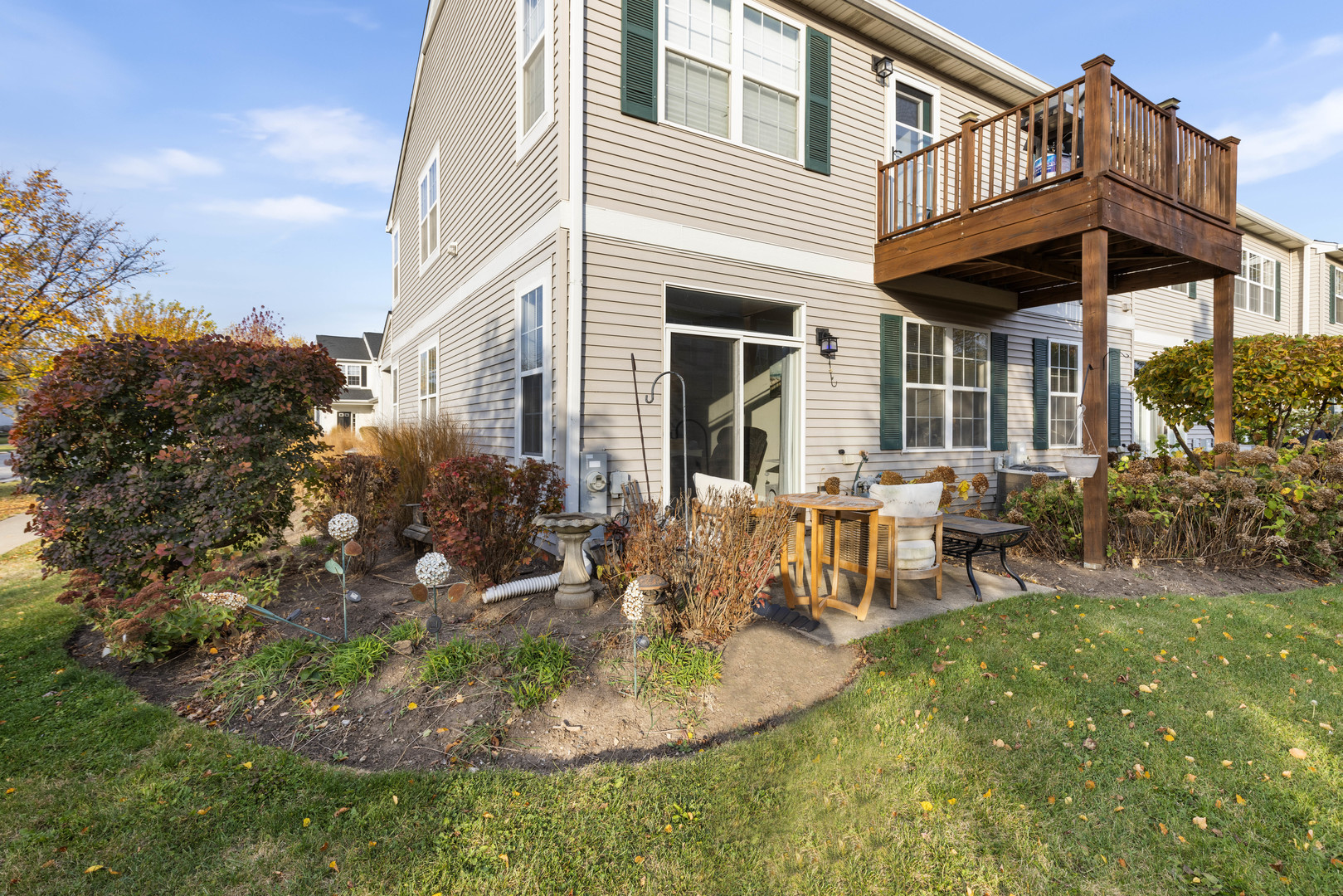 3133 Falling Waters Lane Lindenhurst, IL 60046 - Photo 14 of 15 a view of a house with backyard porch and sitting area