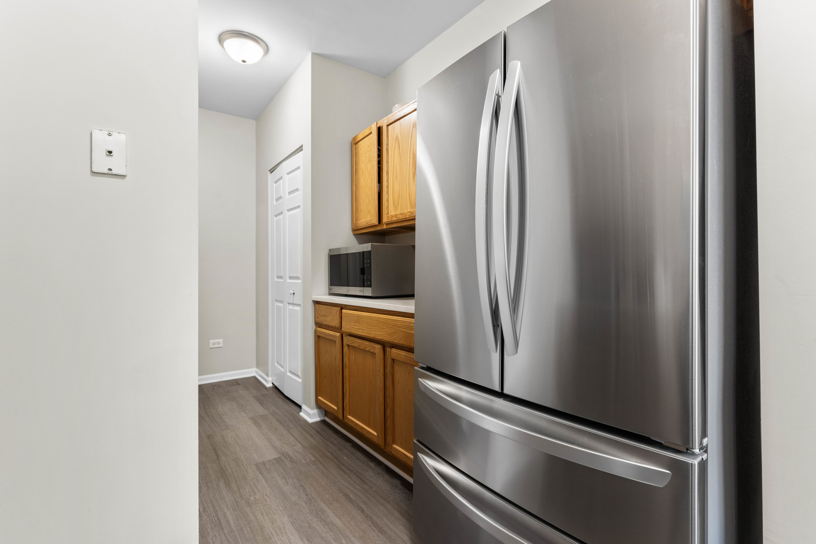 3133 Falling Waters Lane Lindenhurst, IL 60046 - Photo 4 of 15 a kitchen with stainless steel appliances a refrigerator and a sink