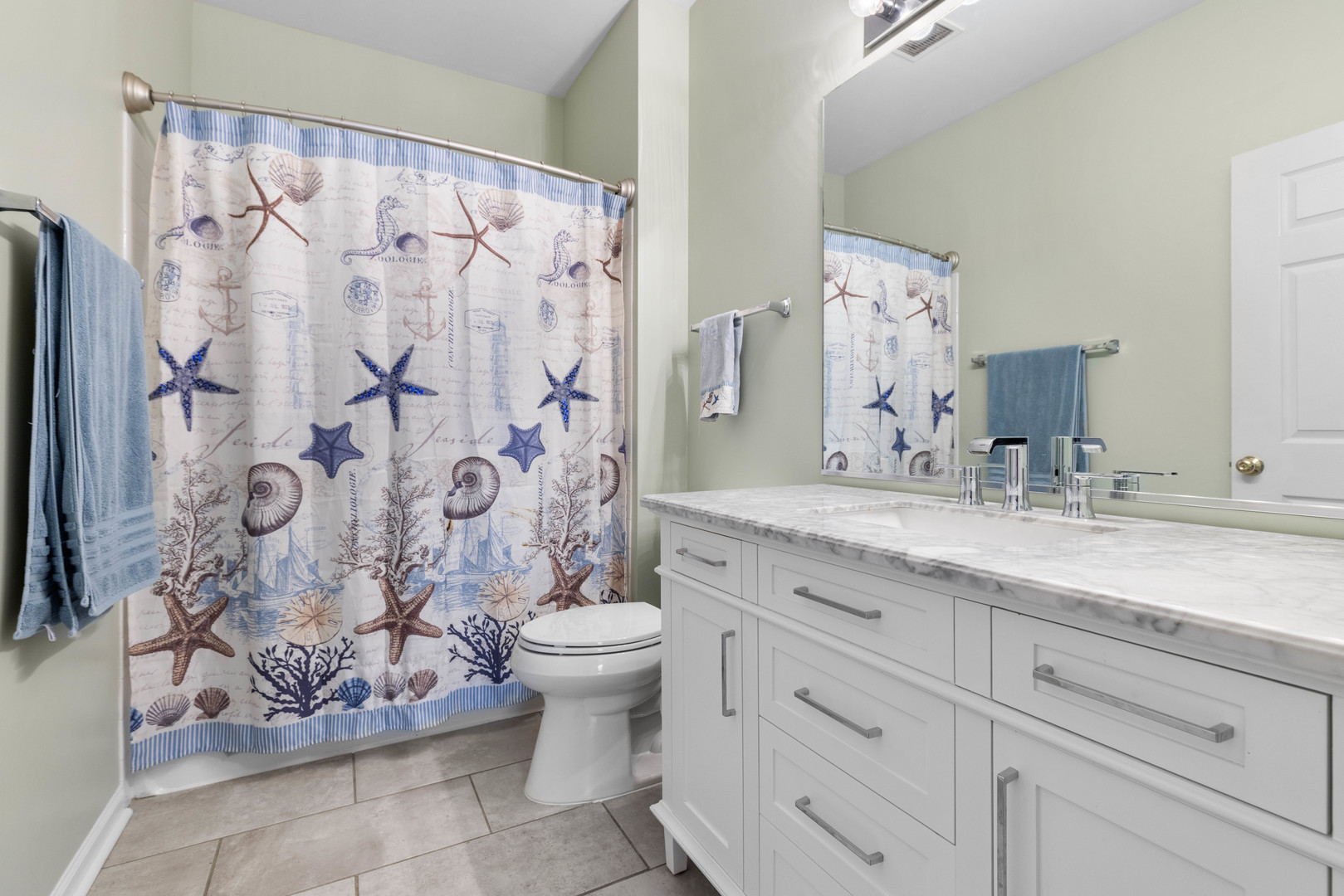 3133 Falling Waters Lane Lindenhurst, IL 60046 - Photo 10 of 15 a bathroom with a granite countertop sink a toilet and a shower curtain