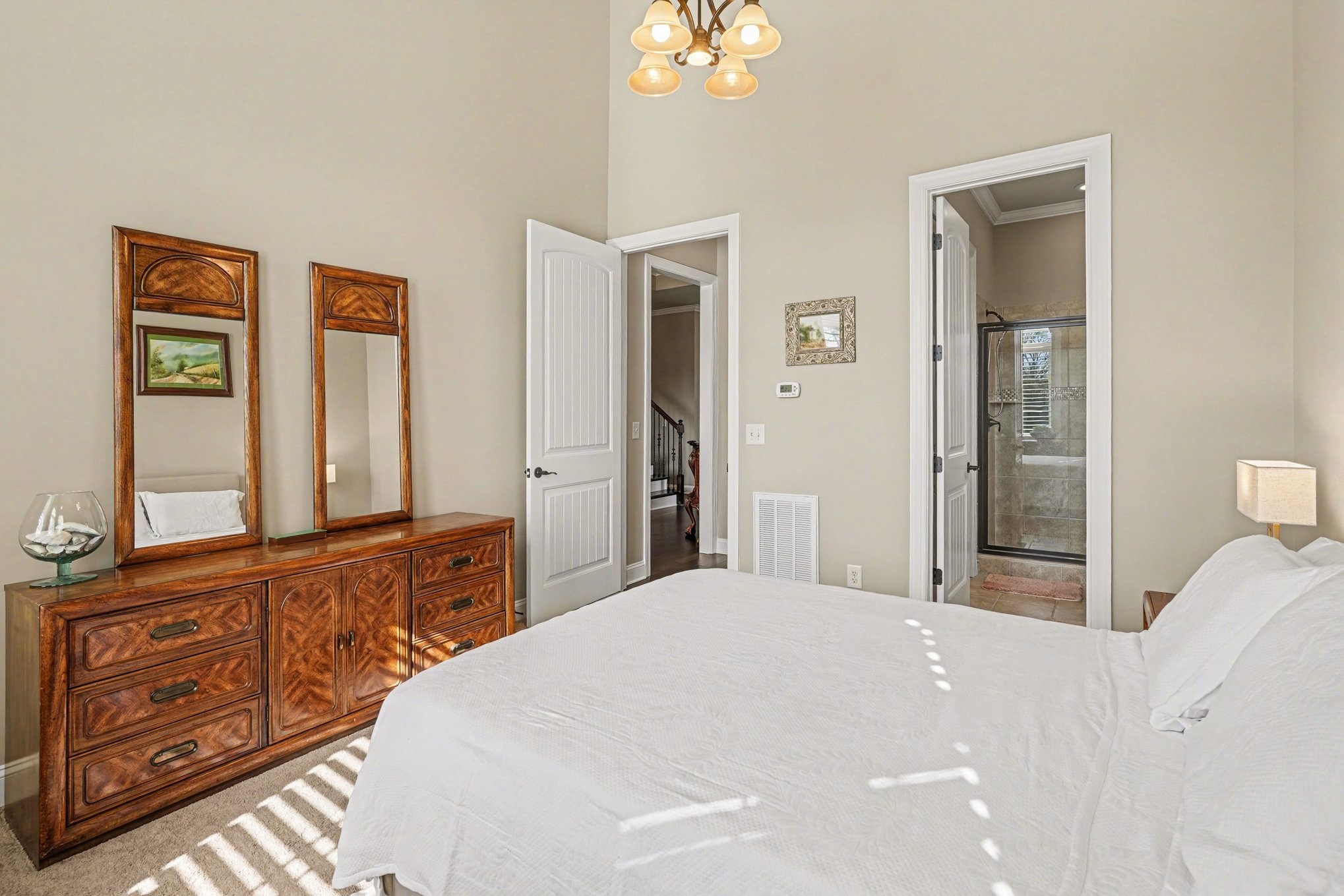 5094 Moss Road Nashville, TN 37221 - Photo 26 of 29 a bedroom with a bed and a dresser