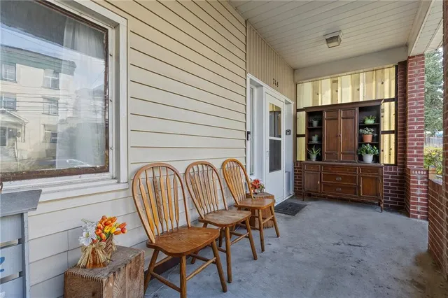 a outdoor living space with furniture and a potted plant