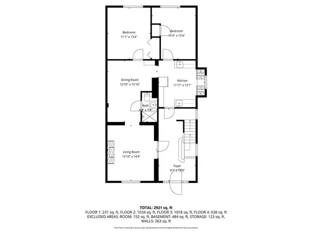 a picture of a bench in front of a building