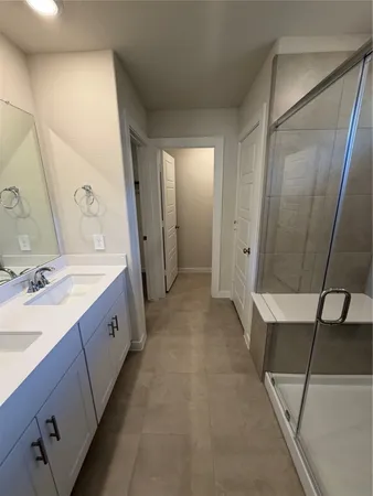 a bathroom with a sink and toilet