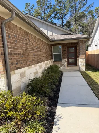 a view of a large bed and a yard