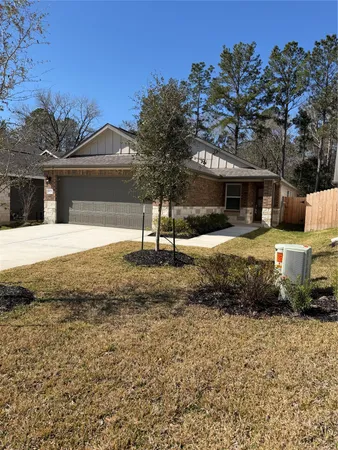 a view of a yard with cars