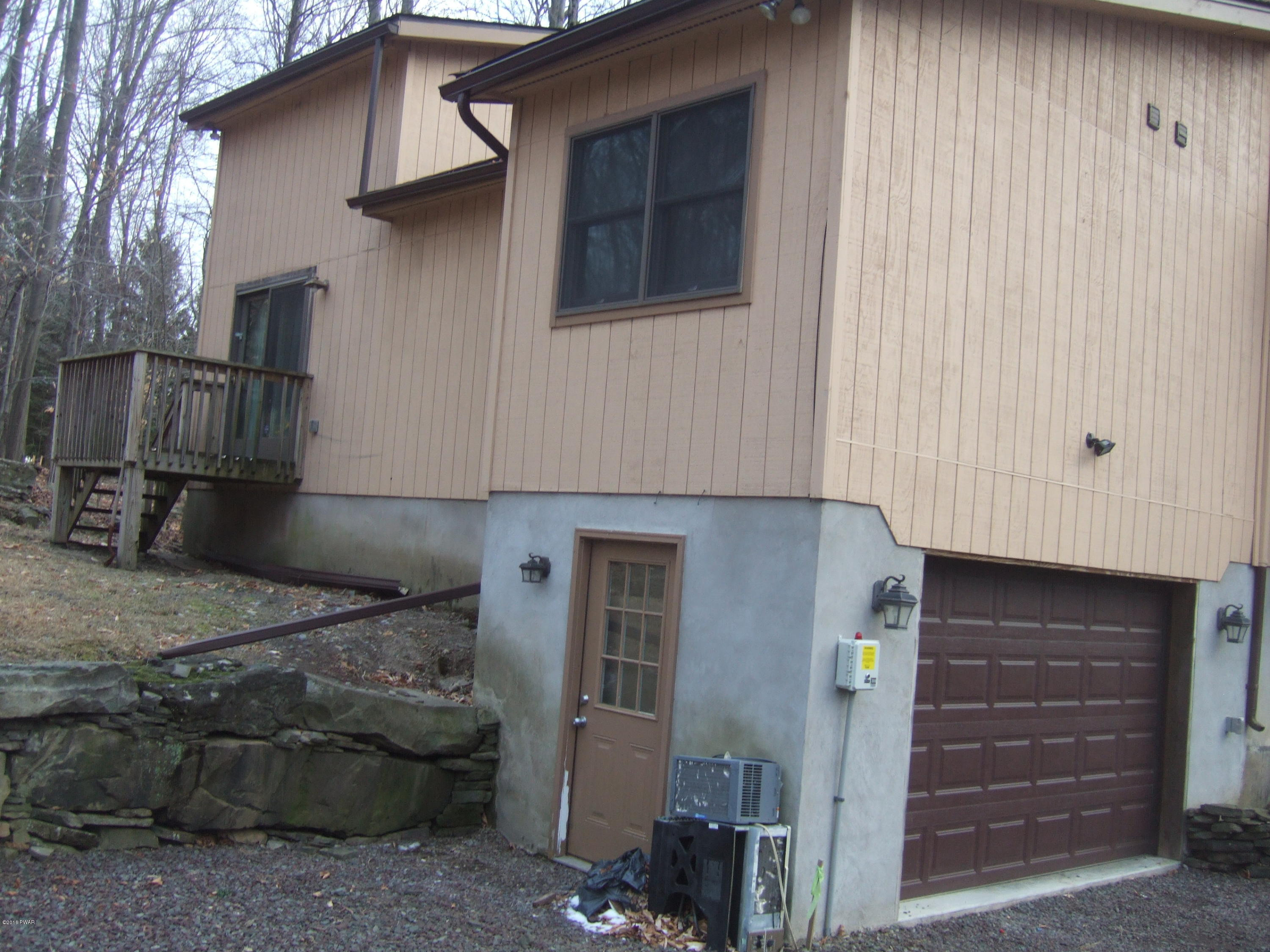 2654 Boulder Road Lake Ariel, PA 18436 - Photo 2 of 40 a front view of a house with stairs