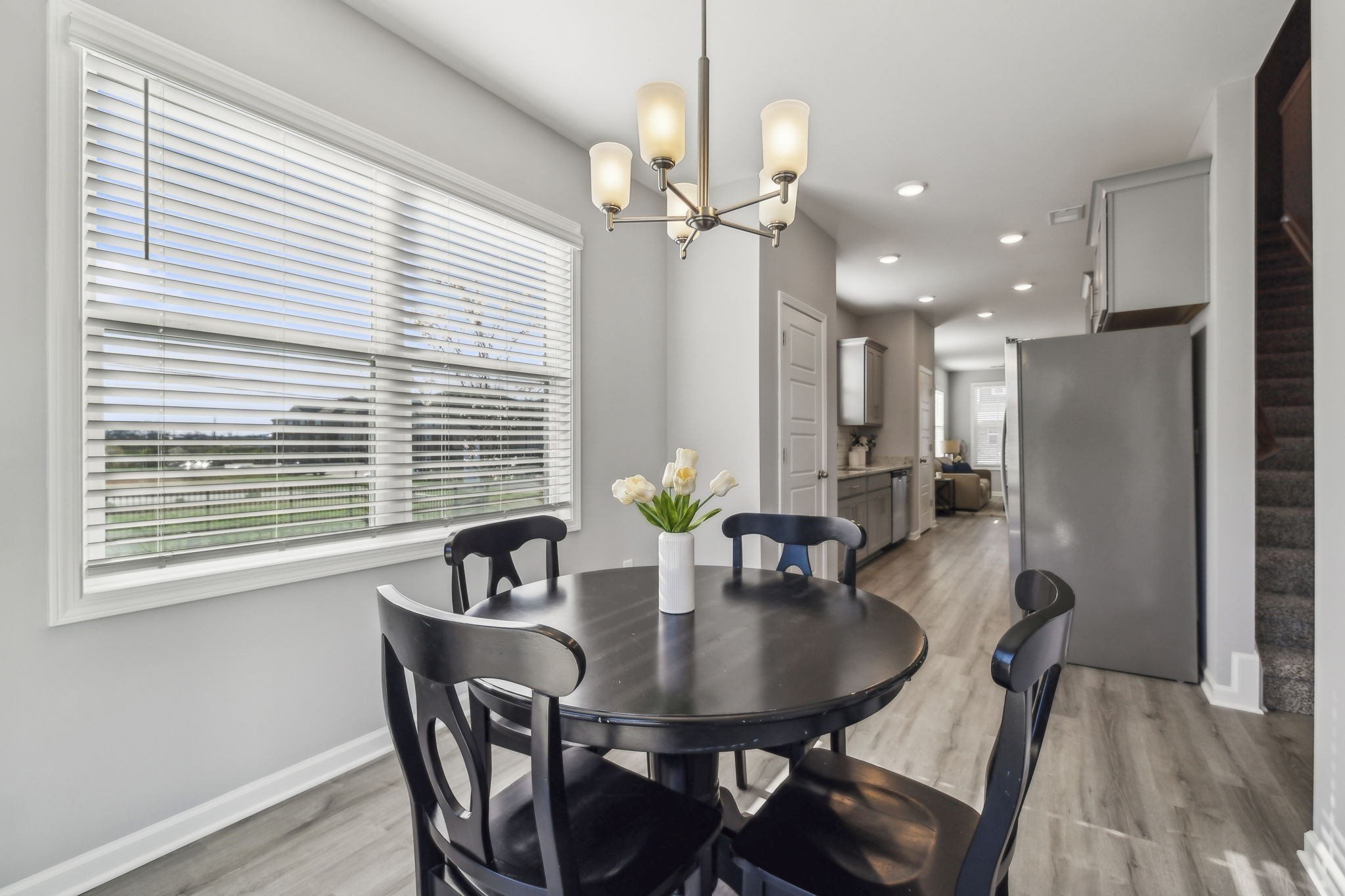 300 Carver Connection Lebanon, TN 37087 - Photo 13 of 36 a view of a dining room with furniture and a chandelier