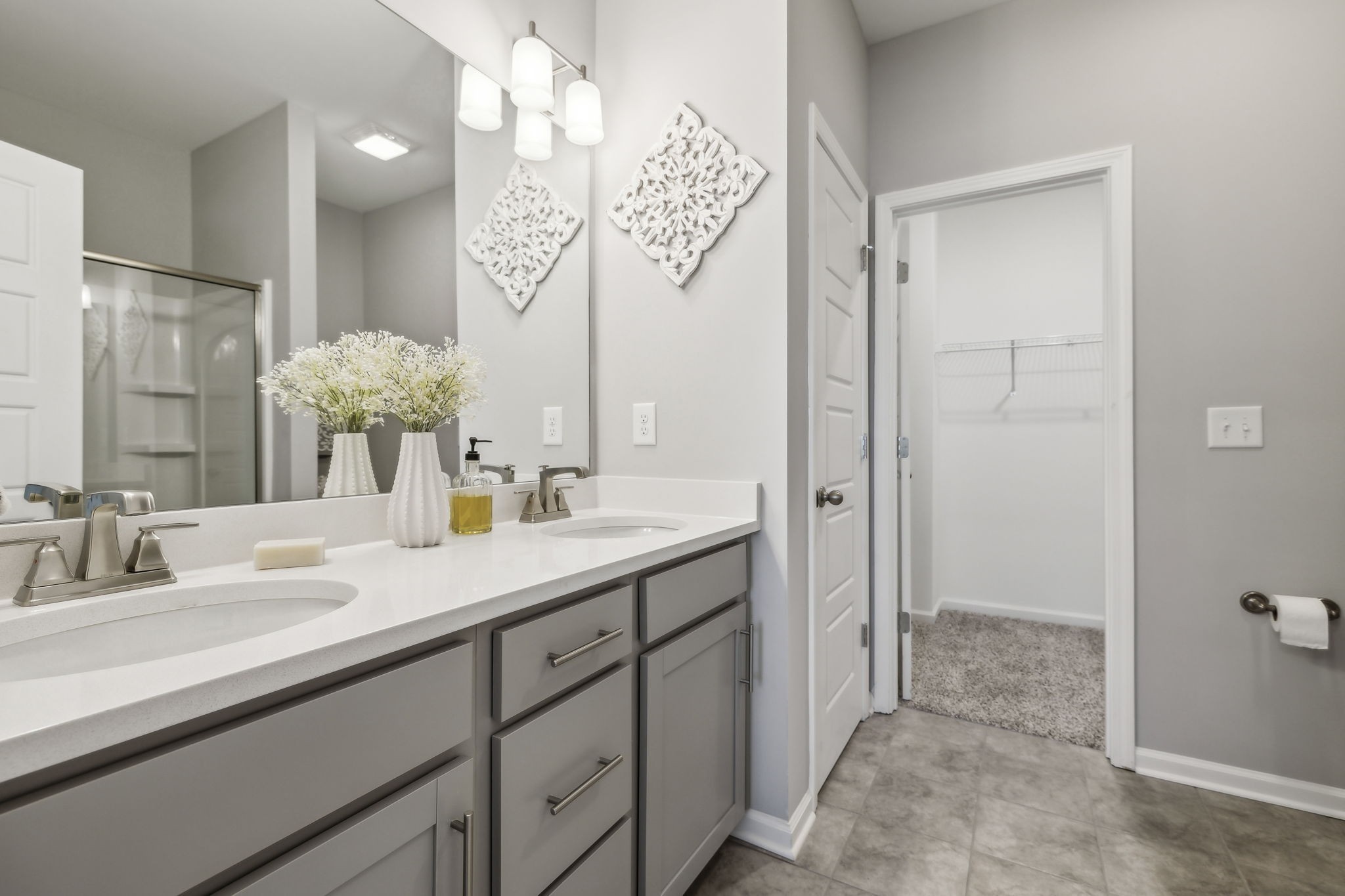 300 Carver Connection Lebanon, TN 37087 - Photo 20 of 36 a bathroom with a sink a mirror and a shower