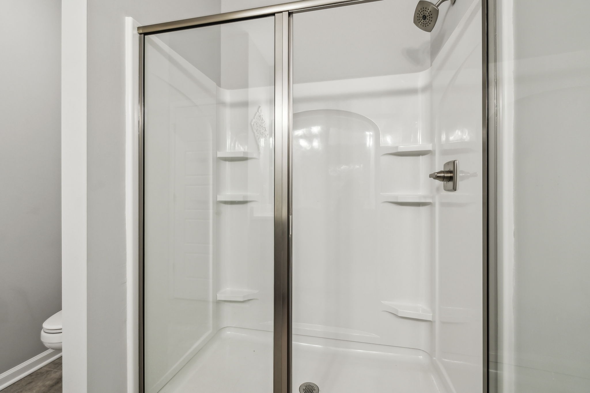 300 Carver Connection Lebanon, TN 37087 - Photo 22 of 36 a bathroom with a glass shower door