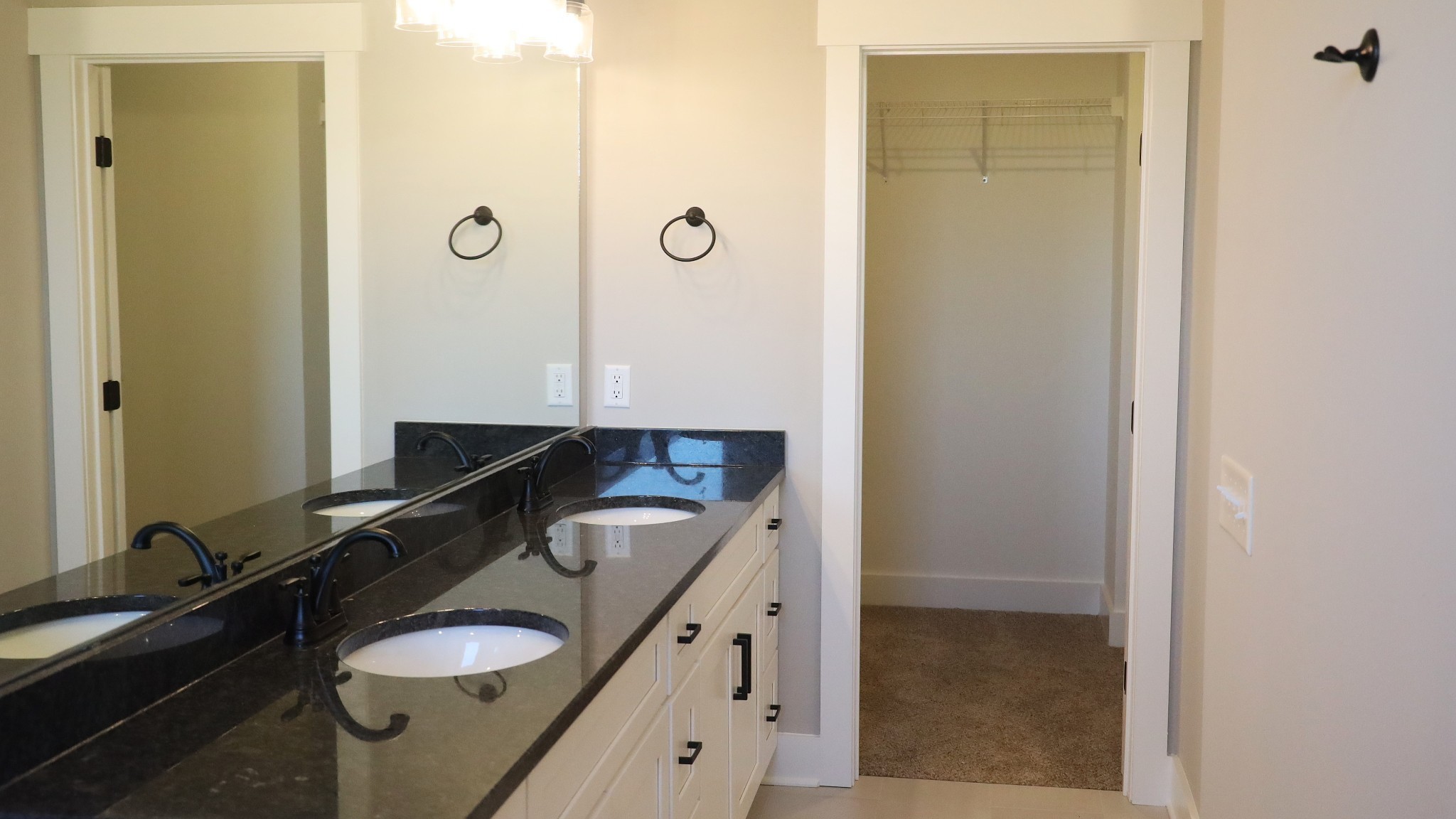 5558 Borthick Road Springfield, TN 37172 - Photo 19 of 53 a bathroom with a granite countertop sink and a mirror