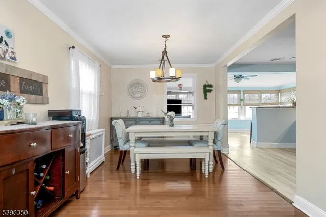 a kitchen with a table and chairs in it