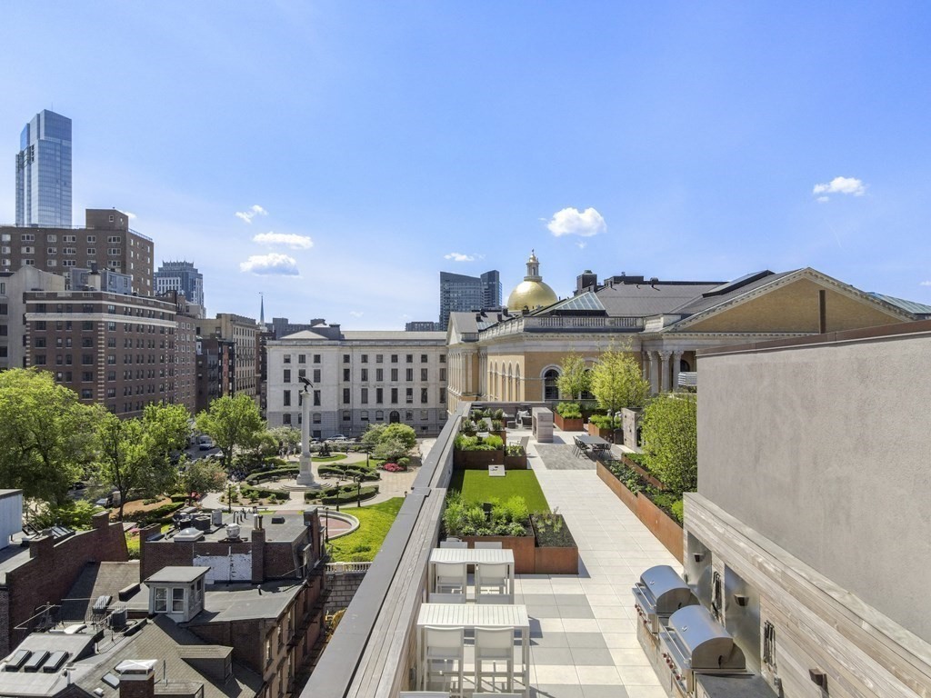 45 Temple Street, Unit 102 Boston, MA 02114 - Photo 11 of 15 a view of a city with tall buildings