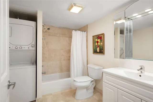 a bathroom with a toilet a sink and a bathtub