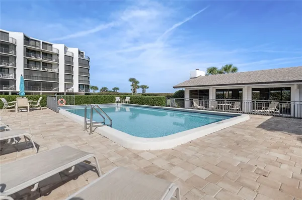 a view of a house with a swimming pool