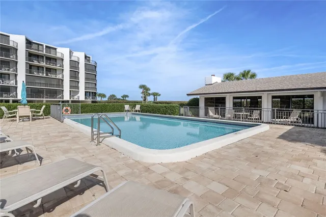 a view of a house with a swimming pool