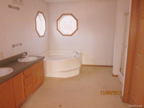 4425 Adams Road Stockbridge, MI 49285 - Photo 9 of 15 9 MASTER BATHROOM.JPG