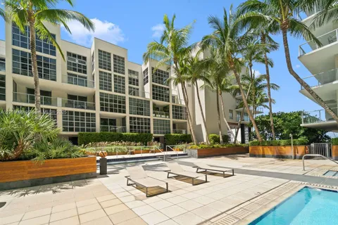 a view of swimming pool with seating area