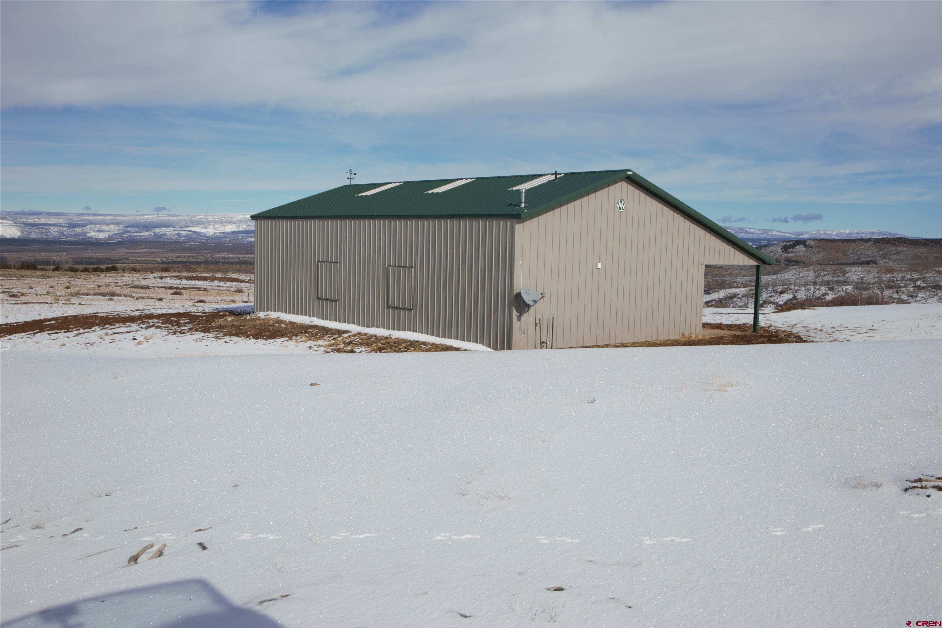 6998 East County Road U 29 Redvale, CO 81431 - Photo 17 of 27 a view of a garage
