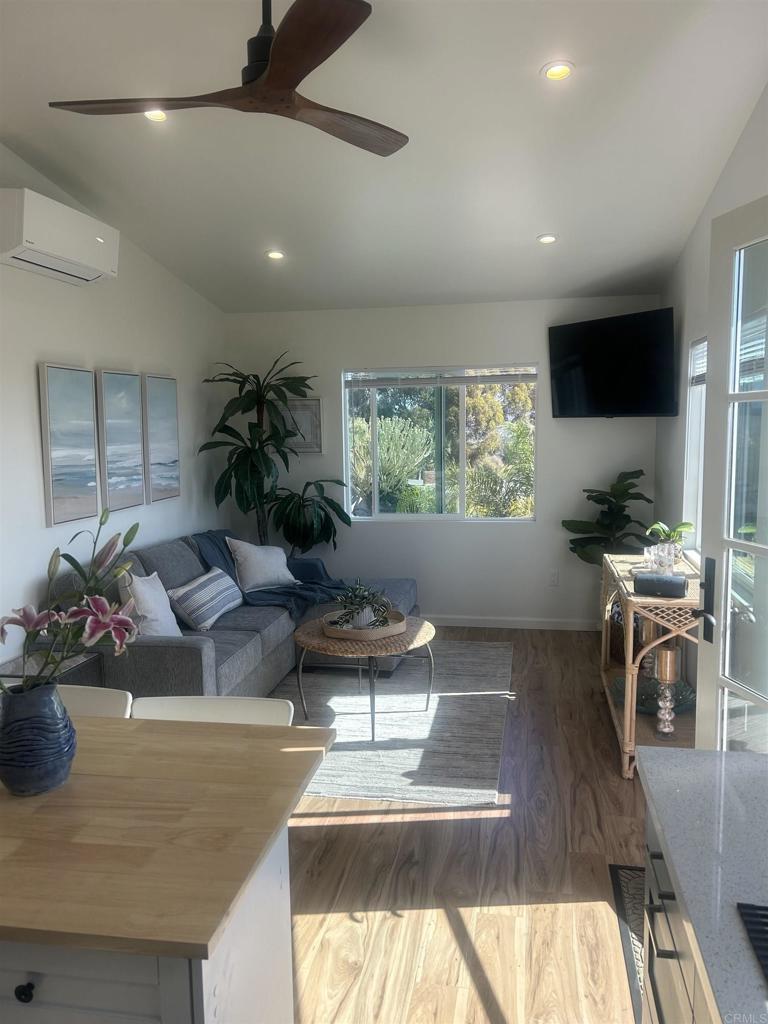 337-2 South Barnwell Street Oceanside, CA 92054 - Photo 7 of 21 a living room with furniture and a flat screen tv
